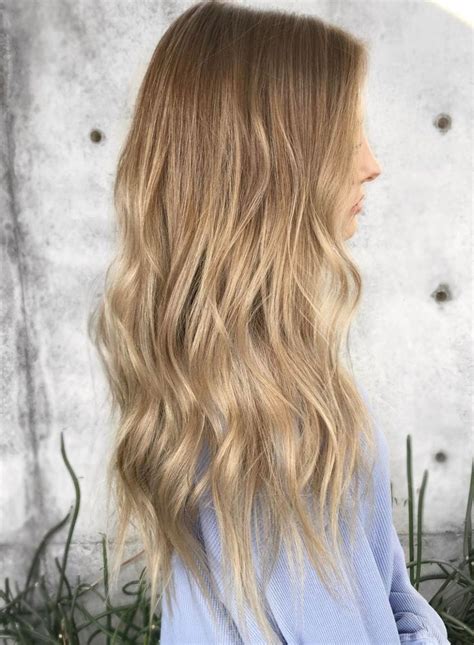 Beachy Waves Style Cool Haircuts with Different Shades of Blonde for Older Women