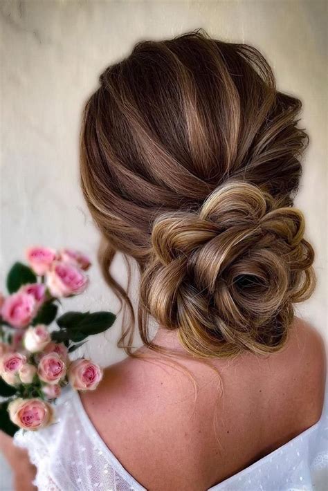 Elegant Low Bun Hairstyles with Timeless Appeal to Wear in 2024