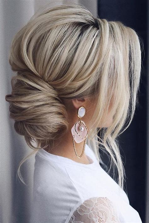 Elegant Updo Hairstyles with Timeless Appeal to Wear in 2024