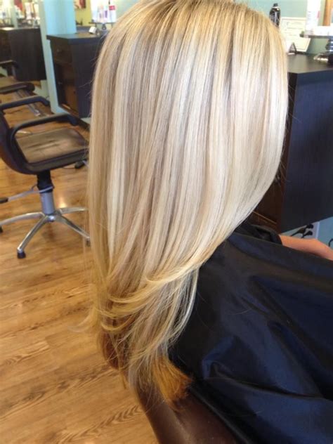 Sleek Layered Blonde Cool Haircuts with Different Shades of Blonde for Older Women