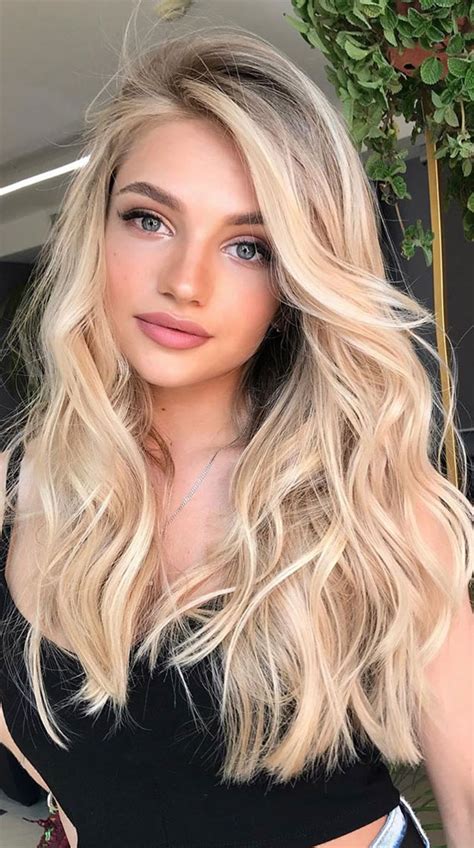 Wavy Blonde Layers Cool Haircuts with Different Shades of Blonde for Older Women